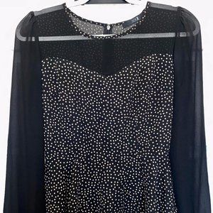 Sheer, black, long sleeve peplum blouse!